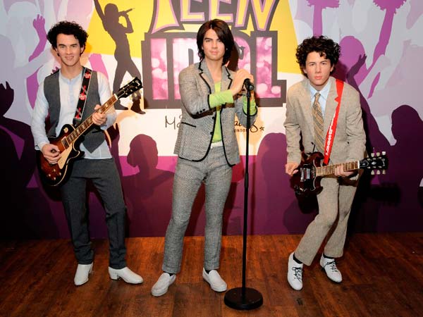 La versión de cera de la banda juvenil The Jonas Brothers en el Museo Madame Tussauds de Londres, Inglaterra. / Foto: Gentileza Museo Madame Tussauds (Clickear en la imagen para agrandar)